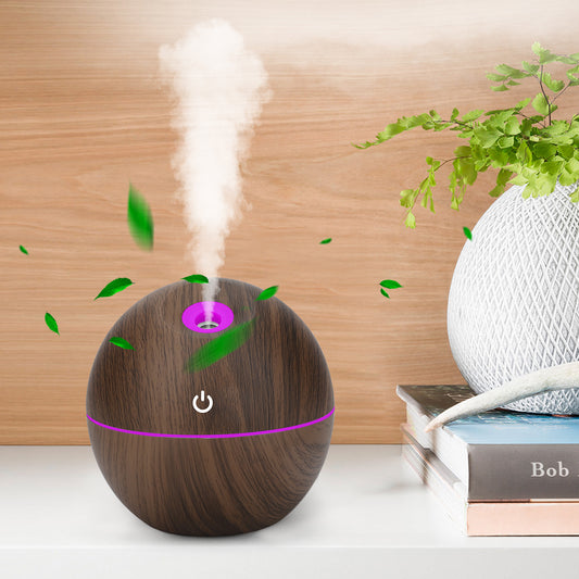 Revitalize Your Space with the USB Aroma Humidifier - Ultrasonic Essential Oil Diffuser with 7 Color LED Light